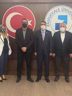 MHP’DEN REKTÖR KUTLUHAN’A NEZAKET ZİYARETİ